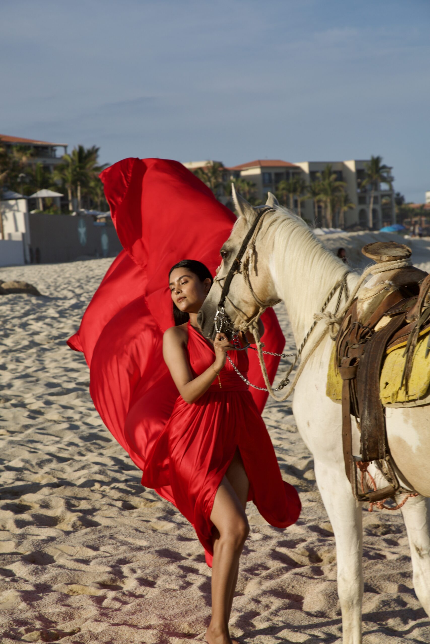 the dress of model Karina Araujo blowing in the wind